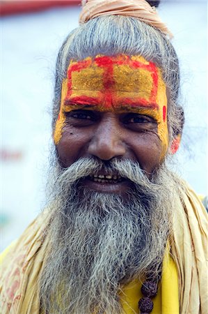 experiencing - India,Rajasthan,Jaisalmer. A wandering sardhu collects alms in the old part of Jaisalmer Fort. Stock Photo - Rights-Managed, Code: 862-03712033