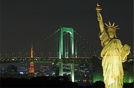 simsearch:862-03712487,k - Tokyo skyline at night including the Tokyo Tower,the Rainbow Bridge and the Statue of Liberty. Stock Photo - Rights-Managed, Code: 862-03712517