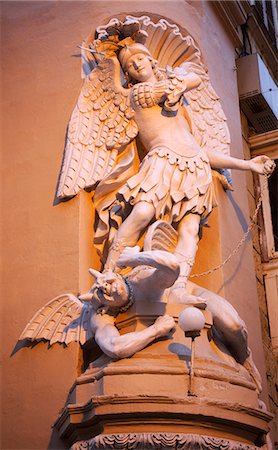 st michael - Europe, Malta, Valletta; St.Michael defeating the devil sculpture on a street corner Stock Photo - Rights-Managed, Code: 862-03712941