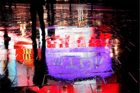 puddle in the rain - England, London. Reflections of the Bill Board at Piccadilly Circus in London. Stock Photo - Rights-Managed, Code: 862-03736648