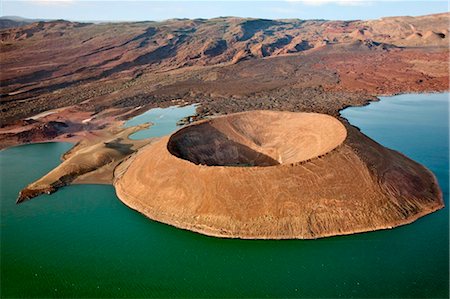 Nabuyatom crater juts into the jade waters at the southern end of Lake Turkana. Stock Photo - Rights-Managed, Code: 862-03736857