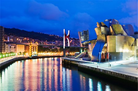 spain night - Spain, Basque Country, Bilbao, The Guggenheim, designed by Canadian-American architect Frank Gehry, on the Nervion River Stock Photo - Rights-Managed, Code: 862-03732394