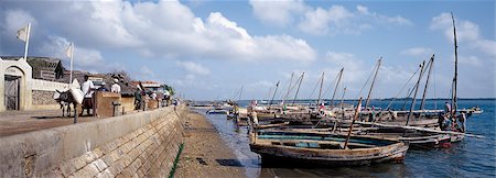 The harbour at Lamu Island.Lamu town already existed in the 14th and 15th centuries and flourished more recently between 1650 and 1900.The town is said to have been founded by one or more royal immigrants from the Arabian or Persian regions on the Caliphate. Stock Photo - Rights-Managed, Code: 862-03820665