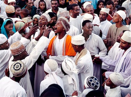 As a part of Maulidi, Lamu Islands celebrations to mark the birthday of the Prophet Mohamed, a keenly fought boat race is held.Maulidi is a joyous event in Lamu and attracts pilgrims from all over East Africa and sometimes farther afield. Stock Photo - Rights-Managed, Code: 862-03820724