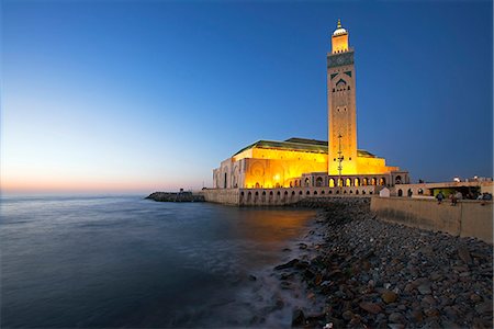 The Hassan II Mosque in Casablanca is the third largest in the world after those at Mecca and Medina, and its minaret, at 210m, is the tallest of all.It was built to commemorate former king Hassan IIs 60th birthday in 1993. Stock Photo - Rights-Managed, Code: 862-03820878