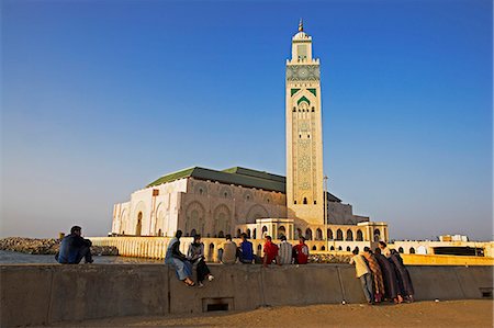 The Hassan II Mosque in Casablanca is the third largest in the world after those at Mecca and Medina, and its minaret, at 210m, is the tallest of all.It was built to commemorate former king Hassan IIs 60th birthday in 1993. Stock Photo - Rights-Managed, Code: 862-03820870