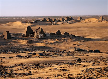 sudan - Situated a short distance east of the Nile, the ancient pyramids of Meroe are an important burial ground of thirty kings, eight queens and three princes of the Kingdom of Cush who reigned during the Afro Egyptian Meroitic period roughly between 300BC and 300AD. Stock Photo - Rights-Managed, Code: 862-03820974