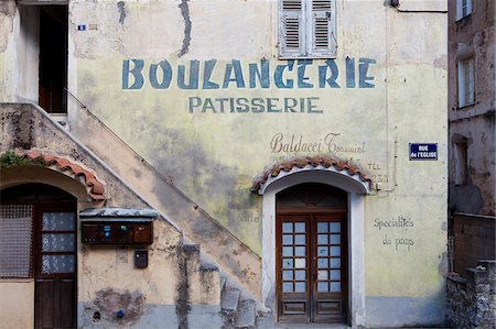 french buildings image - The facade of a bakery in Corte on the island of Corsica in France Stock Photo - Rights-Managed, Code: 862-03887707