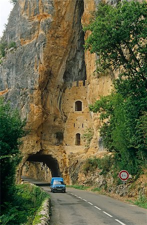 France, Midi Pyrenees, Lot, Bouzies. On a small road by the River Lot, the Defile des Anglais, a tiny fortification from the Hundred Years War, nestles in a rocky cleft. Stock Photo - Rights-Managed, Code: 862-03887803
