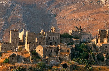 Greece, Peloponnese, Laconia, Mani, Vathia. The part-ruined village of Vathia is a fine example of the traditional tower house architecture that dominated this wild and once inaccessible region. Stock Photo - Rights-Managed, Code: 862-03888311