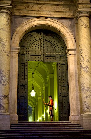 Rome, Italy; A Swiss guard at the entrance gates to the Vatican Stock Photo - Rights-Managed, Code: 862-03888644