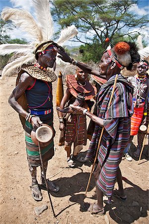 simsearch:862-03888708,k - The Pokot have a small ceremony called Koyogho when a man pays his in-laws the balance of the agreed dowry for his wife.  This may take place many years after he marries her. At the conclusion of the ritual, his father-in-law blesses him. Stock Photo - Rights-Managed, Code: 862-03888710
