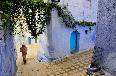 Wandering through the bluish Chefchaouen medina. Morocco Stock Photo - Rights-Managed, Code: 862-03888902