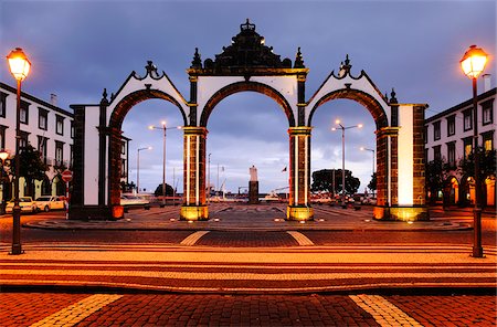 simsearch:862-03889206,k - The Portas da Cidade (Gates to the City), are the historical entrance to the village of Ponta Delgada and the ex-libris of the city since the 18th century. Sao Miguel, Azores islands, Portugal Stock Photo - Rights-Managed, Code: 862-03889126