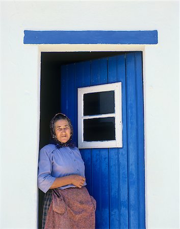 An old woman in front of her traditional house, Ribatejo, Portugal Stock Photo - Rights-Managed, Code: 862-03889324