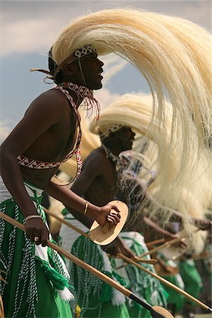 equatorial africa - Vruniga, Rwanda. Traditional Intore dancers perform at the annual gorilla naming ceremony, Kwita Izina. Stock Photo - Rights-Managed, Code: 862-03889483