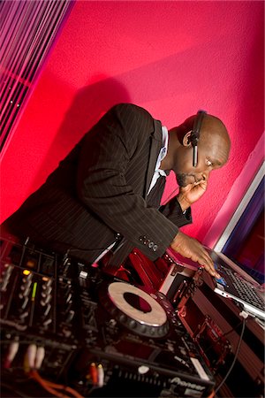 Kigali, Rwanda. A DJ entertains at a local nightclub. Stock Photo - Rights-Managed, Code: 862-03889503