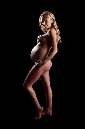 pregnancy nude - Naked pregnant woman Photographie de stock - Rights-Managed, Code: 877-06834111