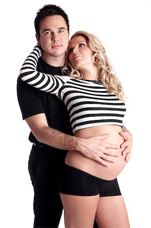 simsearch:877-06834121,k - Man with hands on stomach of pregnant woman Stock Photo - Rights-Managed, Code: 877-06834264