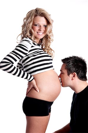 simsearch:877-06834121,k - Man kissing stomach of pregnant woman Stock Photo - Rights-Managed, Code: 877-06834266