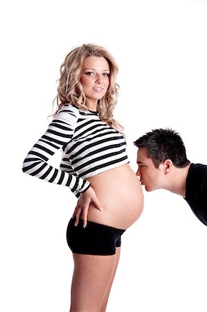 simsearch:877-06834121,k - Man kissing stomach of pregnant woman Stock Photo - Rights-Managed, Code: 877-06834267
