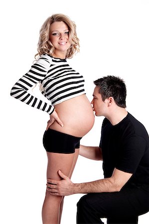 simsearch:877-06834121,k - Man kissing stomach of pregnant woman Stock Photo - Rights-Managed, Code: 877-06834268