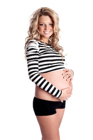 simsearch:877-06834121,k - Pregnant woman with hands on stomach Stock Photo - Rights-Managed, Code: 877-06834274
