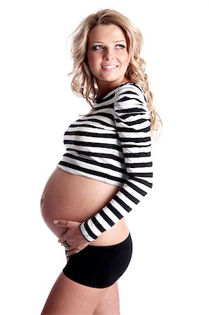 simsearch:877-06834121,k - Pregnant woman with hands on stomach Stock Photo - Rights-Managed, Code: 877-06834277