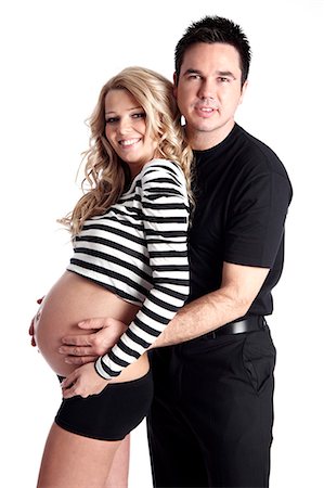 simsearch:877-06834121,k - Man with hands on stomach of pregnant woman Stock Photo - Rights-Managed, Code: 877-06834270