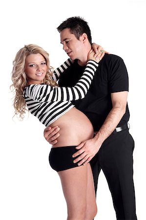 simsearch:877-06834121,k - Pregnant woman and man embracing Stock Photo - Rights-Managed, Code: 877-06834271