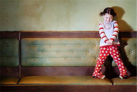 simsearch:877-06833898,k - Young girl having fun indoors Stock Photo - Rights-Managed, Code: 877-06834947