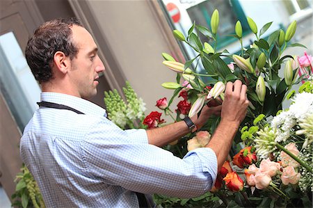 flower sale - Male florist in his shop Stock Photo - Rights-Managed, Code: 877-06835638
