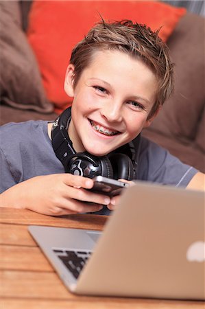 France, young boy with a computer Stock Photo - Rights-Managed, Code: 877-06835801