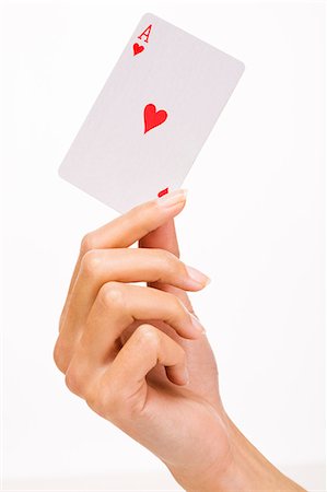 Woman's hand holding a playing card (ace of heart) Stock Photo - Rights-Managed, Code: 877-06832648