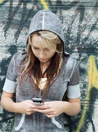simsearch:877-06833898,k - Teenage girl using mobile phone Stock Photo - Rights-Managed, Code: 877-06833842