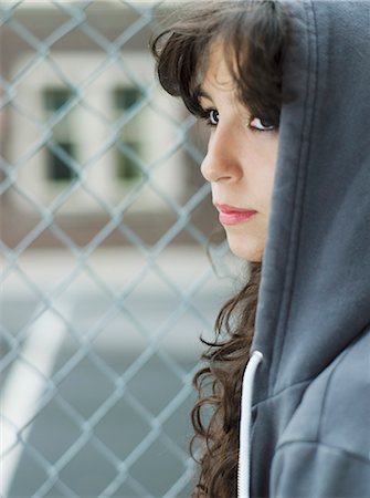 Teenage girl with hooded jacket Stock Photo - Rights-Managed, Code: 877-06833957