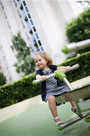 A little girl at the park Photographie de stock - Rights-Managed, Code: 877-07460640