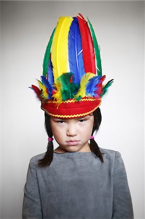 feather headdress - Portrait of girl Stock Photo - Rights-Managed, Code: 877-07460643