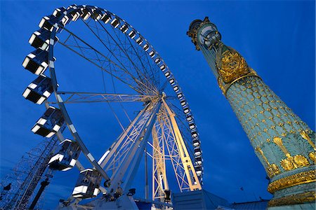 paris street lamps - Europe,France, Ferris wheel on the Place de la Concorde in Paris, Napoleonic street lamp in foreground Foto de stock - Con derechos protegidos, Código: 877-08078994