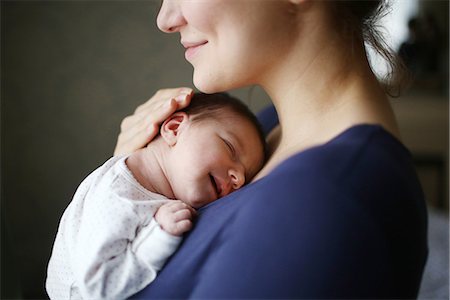 A 10 days baby girl in the arms of her mother Stock Photo - Rights-Managed, Code: 877-08079102