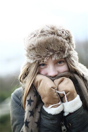 preteen winter - Portrait of a teenage girl wearing a fur hat Stock Photo - Rights-Managed, Code: 877-08128117