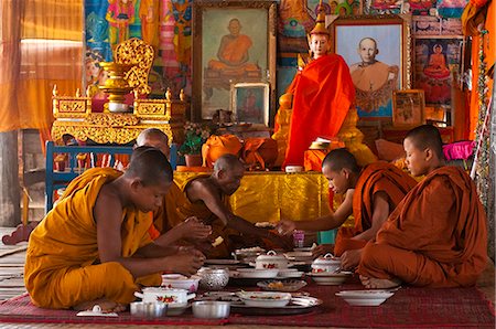 Camdodia, Siem Reap Province, Tonle Sap Lake, site classified Unesco biosphere in 1997, the Kampong Pluk village, pagoda, the monks only meal of the day Stock Photo - Rights-Managed, Code: 877-08128296