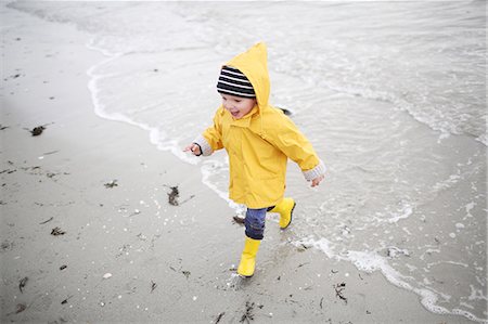 3 years old boy playing in the water at the beach Stock Photo - Rights-Managed, Code: 877-08129130