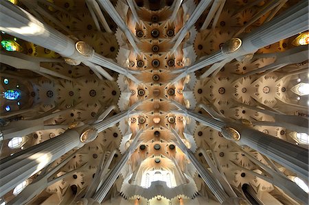 spain, not people - Sagrada Familia. Basilica and Expiatory Church of the Holy Family in Barcelona. Antoni Gaudi. Interior. Column, ceiling and stained glass window. Spain. Stock Photo - Rights-Managed, Code: 877-08129542
