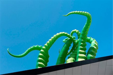 Canada. Province of Quebec. Montreal. The city center.Place of the Festivals during the festival " Just to laugh " (the biggest humor festival in the world). Inflatable sculpture of octopus tentacles Stock Photo - Rights-Managed, Code: 877-08898279