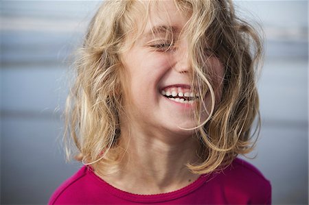 expression - A laughing six year old gir. A portrait. Stock Photo - Rights-Managed, Code: 878-07442493