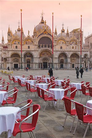 europe coffee shop - Europe, Italy, Veneto, Venice. Rows of chairs and tables at the outdoor cafe in St. Mark square Photographie de stock - Rights-Managed, Code: 879-09021037