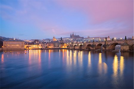 simsearch:400-05162857,k - Prague, Czech Republic Charles Bridge, the castle and a glimpse of the city photographed at dawn Stock Photo - Rights-Managed, Code: 879-09021375