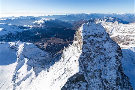 pennine alps - Aerial view of the snowy peak of Matterhorn and Valtournenche Zermatt canton of Valais Switzerland Europe Stock Photo - Rights-Managed, Code: 879-09034029