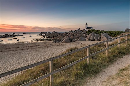 path of stone - Sunset behind Pontusval lighthouse. Brignogan Plage, Finistère, Brittany, France. Stock Photo - Rights-Managed, Code: 879-09033300